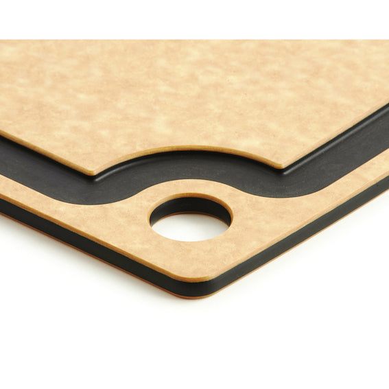 Close-up of a wooden Epicurean cutting board with a black border on a white background