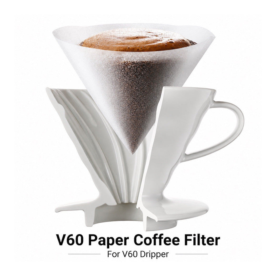 White V60 paper coffee filter set with a dripper and cone-shaped filter paper, shown with coffee grounds in a cone and text reading 'V60 Paper Coffee Filter For V60 Dripper' on a white background.