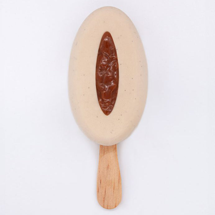 Ice cream popsicle with a wooden handle on a white background