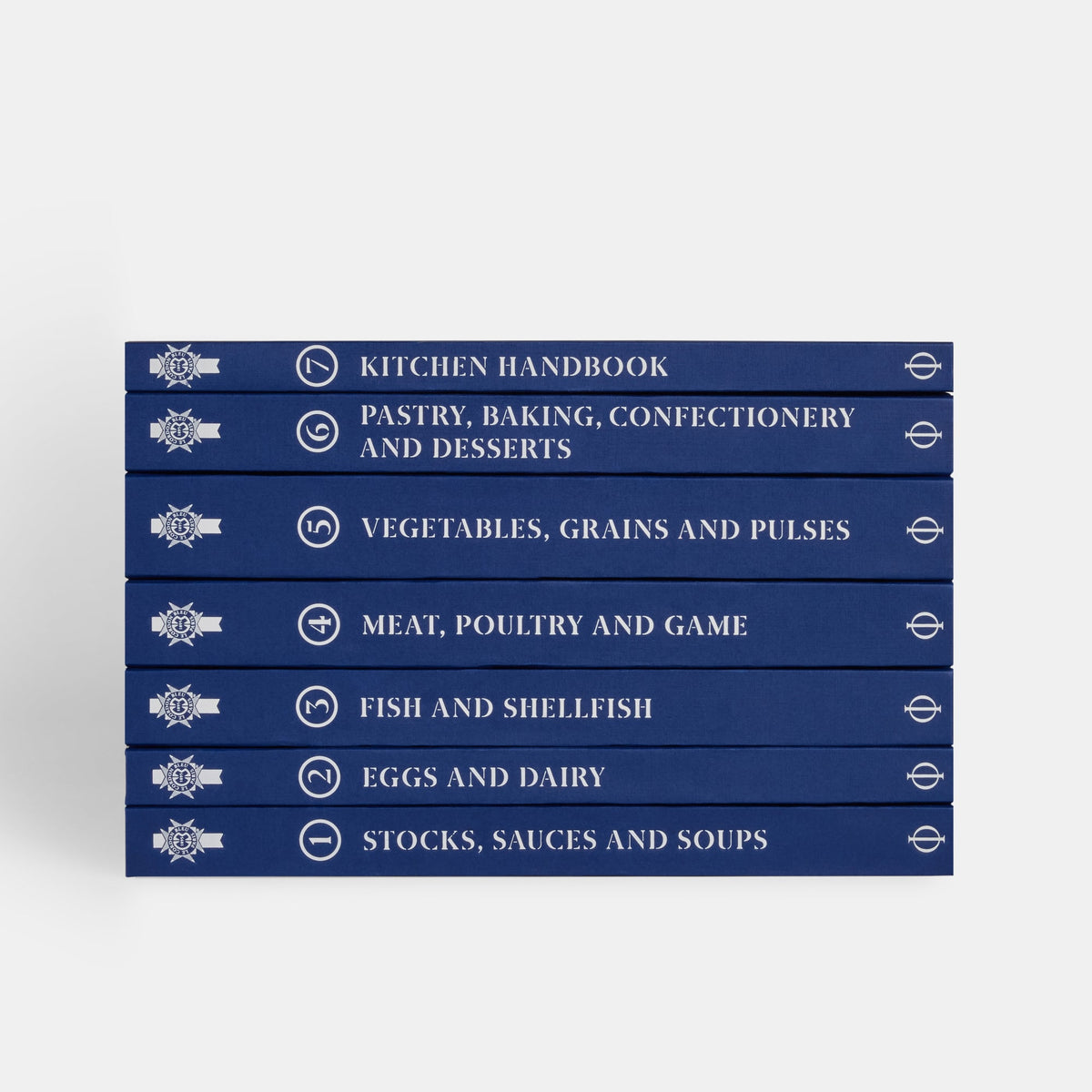 Stack of blue cookbooks on a white background