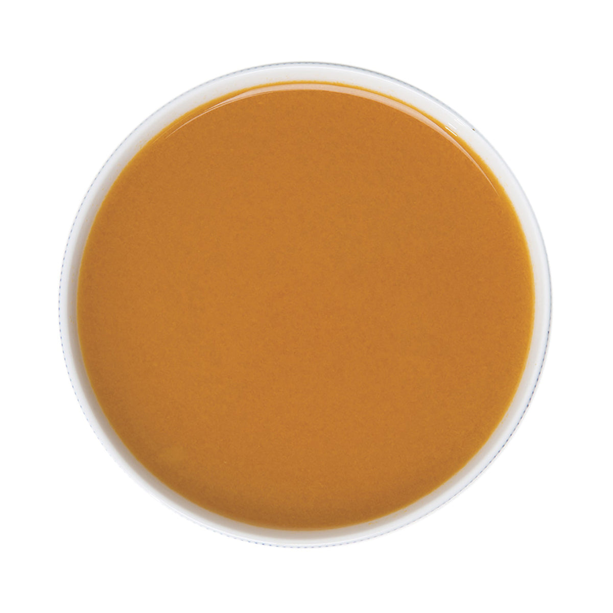 Pacific Fruit Golden Berry puree in a small container on a white background