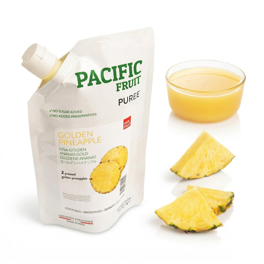 Pacific Fruit Golden Pineapple Puree packaging with pineapple slices and juice on a white background