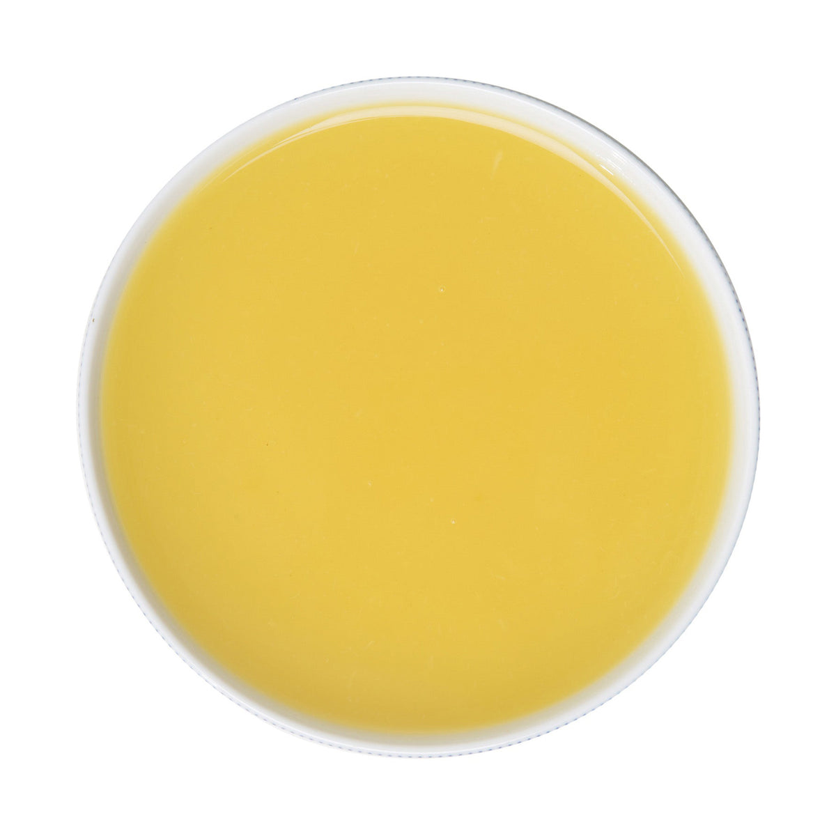 Pineapple puree in a round container on a white background