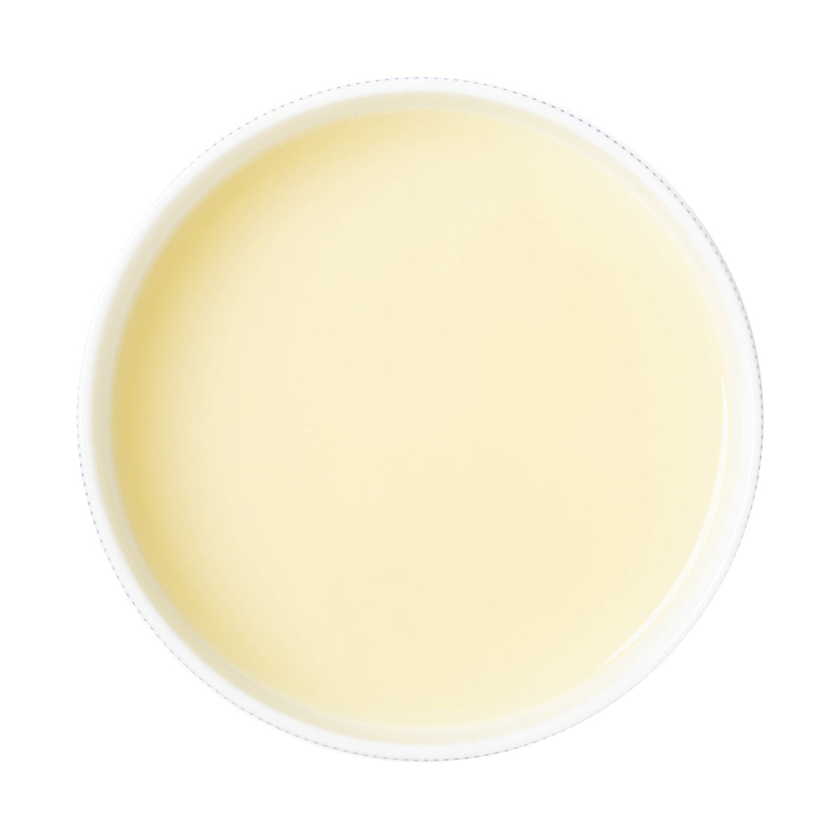 Round container of light yellow lemon puree juice on a white background