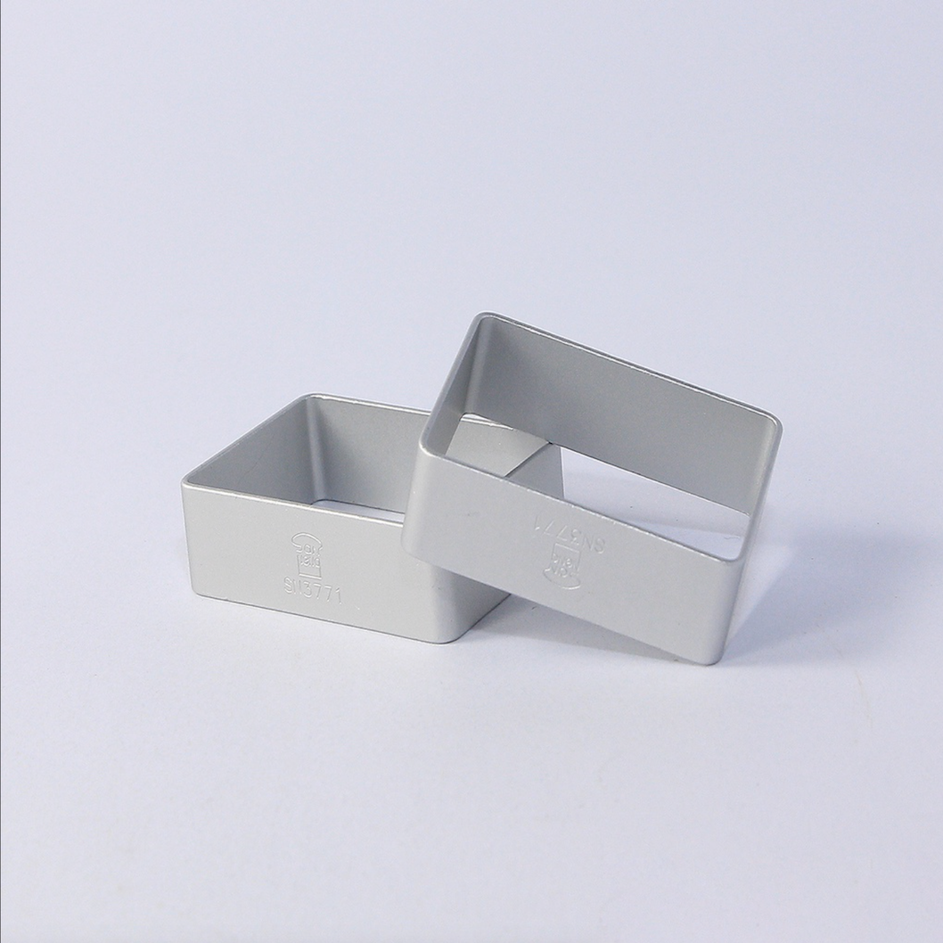 Two Sanneng SN3771 Rectangular Pineapple Cake Rings on a light gray background