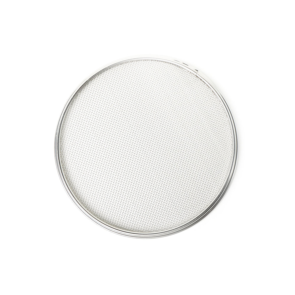 Round white filter with metallic rim on a white background