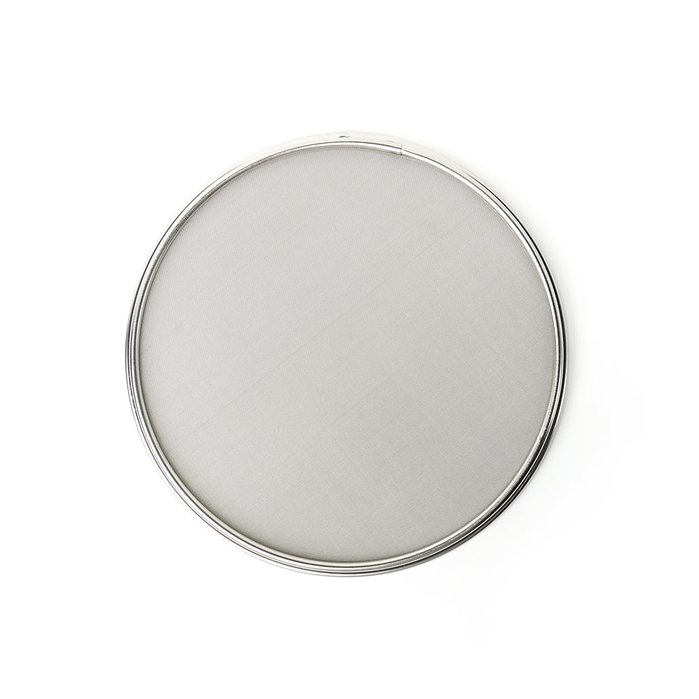 Round silver mesh sieve on a white background