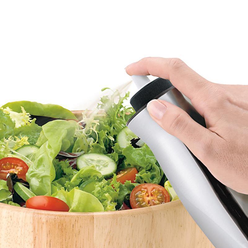 CUISIPRO Stainless Steel Oil Sprayer used on salad