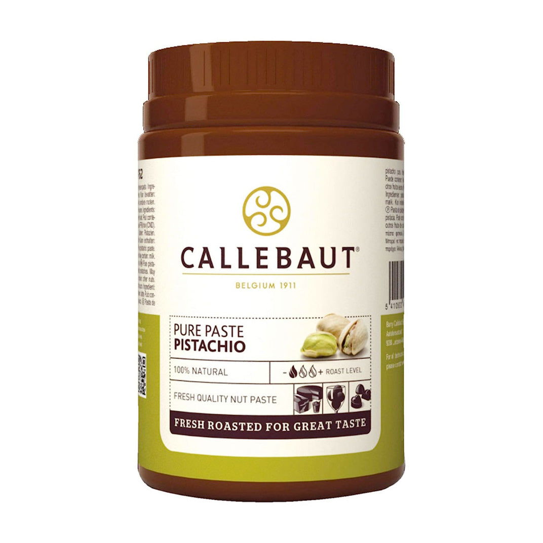 A jar of Callebaut Pure Paste Pistachio fresh roasted nut paste, featuring a brown lid and a cream and olive-green label with the brand logo and product details.