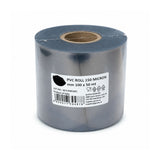 A roll of dark gray PVC cake roll on a cardboard core, with a white product label on the front, photographed on a white background.