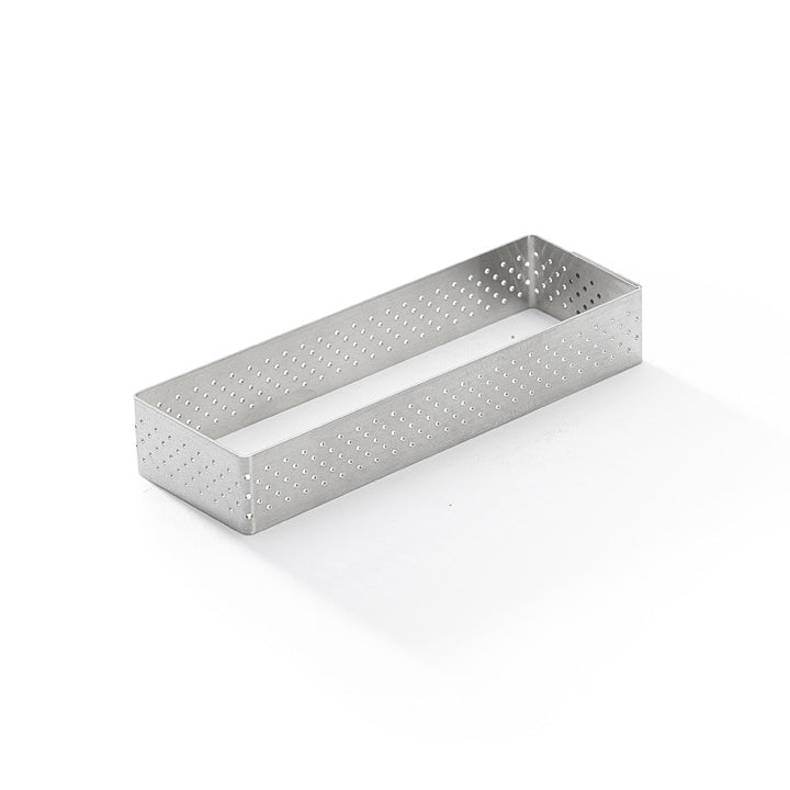 Rectangular De buyer tart ring with perforated design on a white background