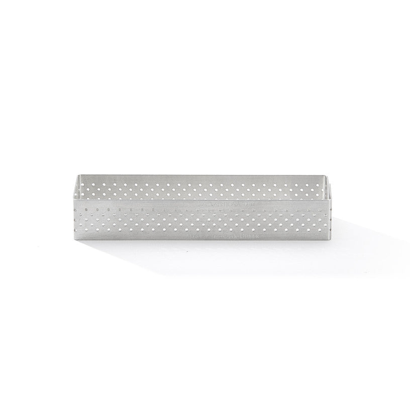 Rectangular De buyer tart ring with perforated design on a white background