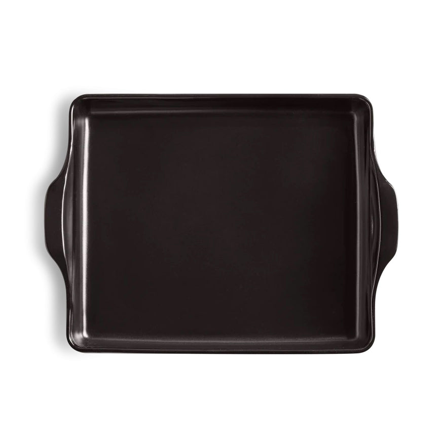 Emile Henry black fusain focaccia bread baker with handles on a white background