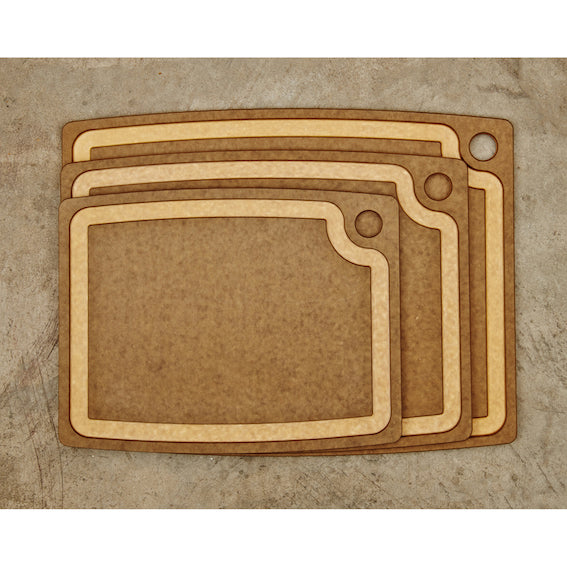 Set of nutmeg Epicurean gourmet series cutting boards on a beige surface