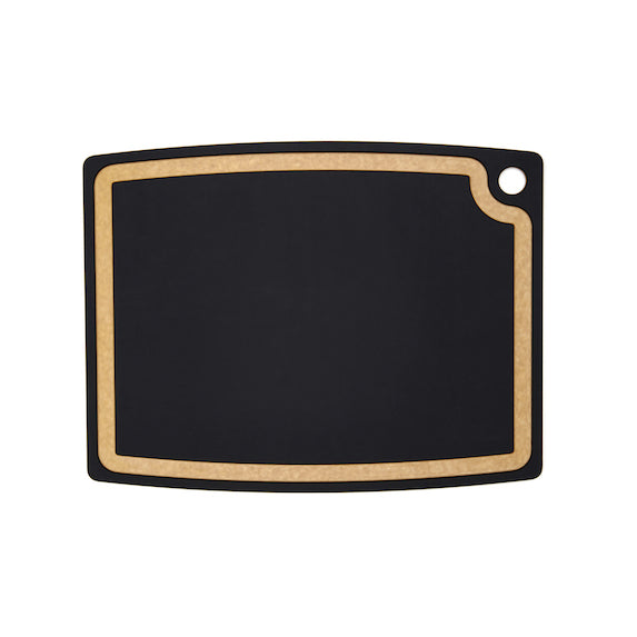 Black Epicurean cutting board with juice groove on a white background