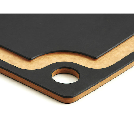 Black and wood Epicurean gouremet cutting board with a hole for hanging on a white background
