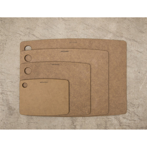 Set of three Epicurean kitchen series cutting boards in Nutmeg on a stone surface