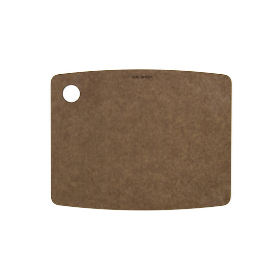 Nutmeg Epicurean kitchen series cutting board with a round hole on a white background