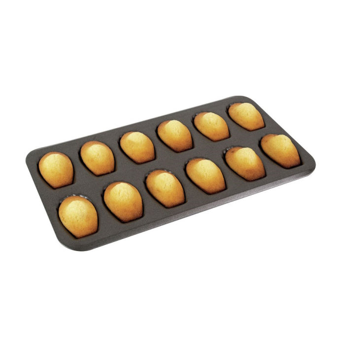 Gobel non-stick bakeware with madeleine cookies on a white background