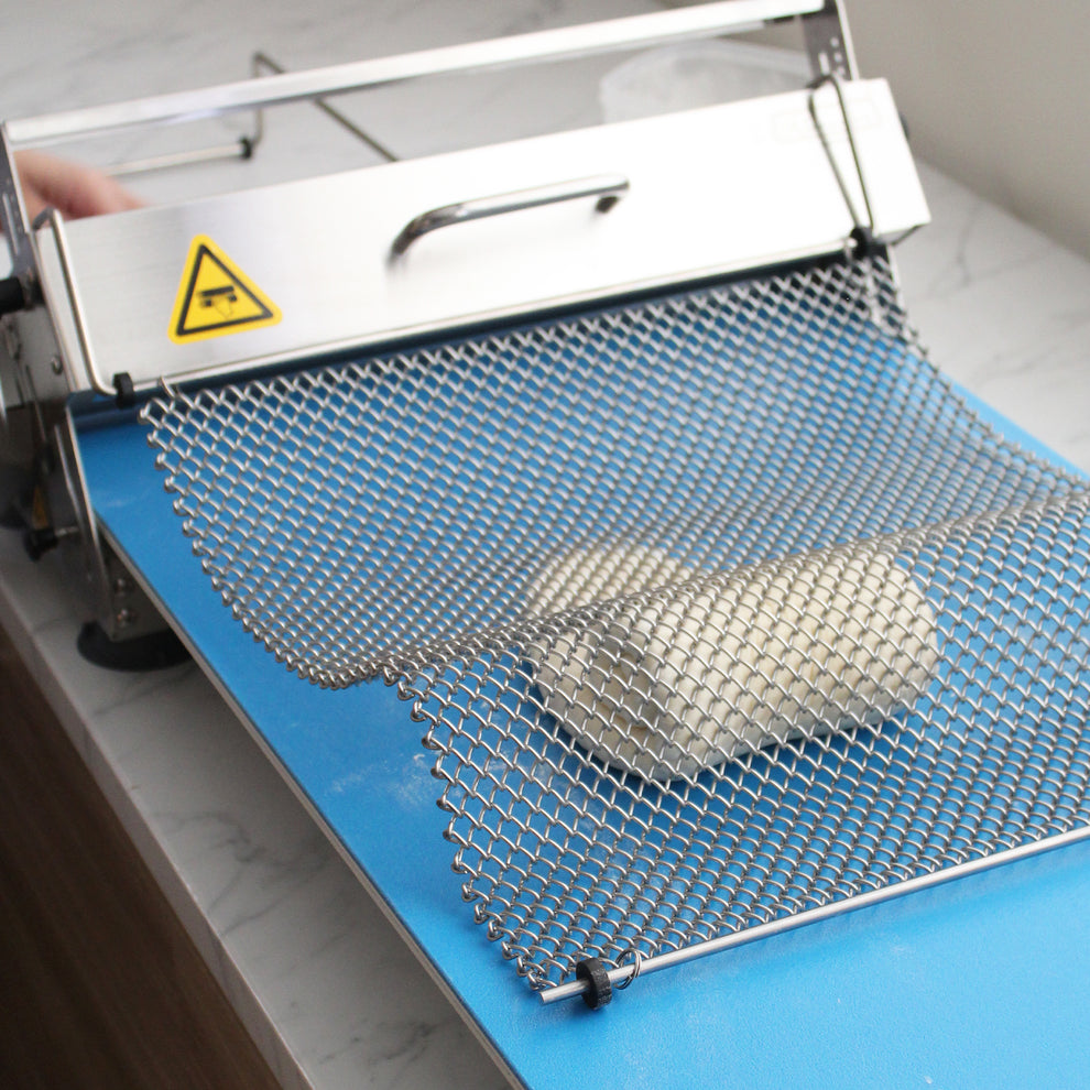 Kneader dough sheeter RS201 with curling chain on a white background