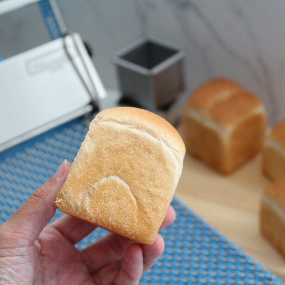 Milk bread / Shokupan with Kneader curl chain in the background