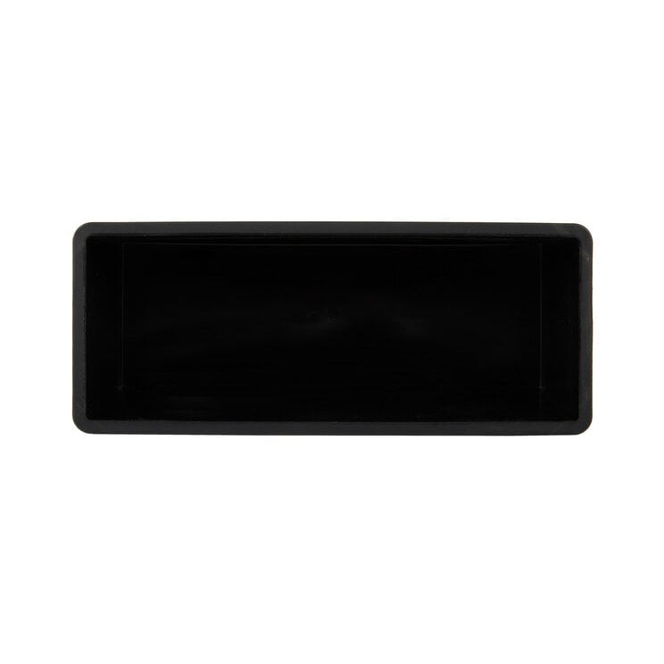 Interior of the black rectangular Matfer loaf pan on a white background