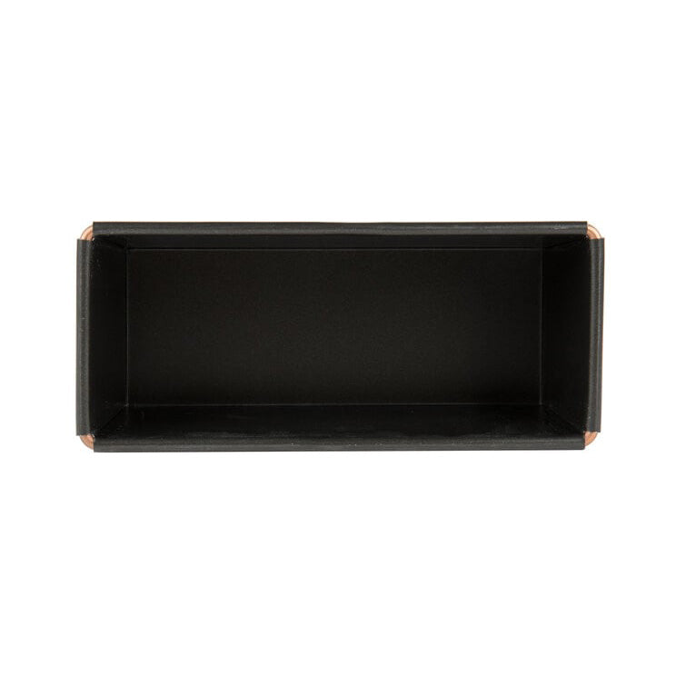 Black rectangular Matfer cake mould with copper lined corner on a white background