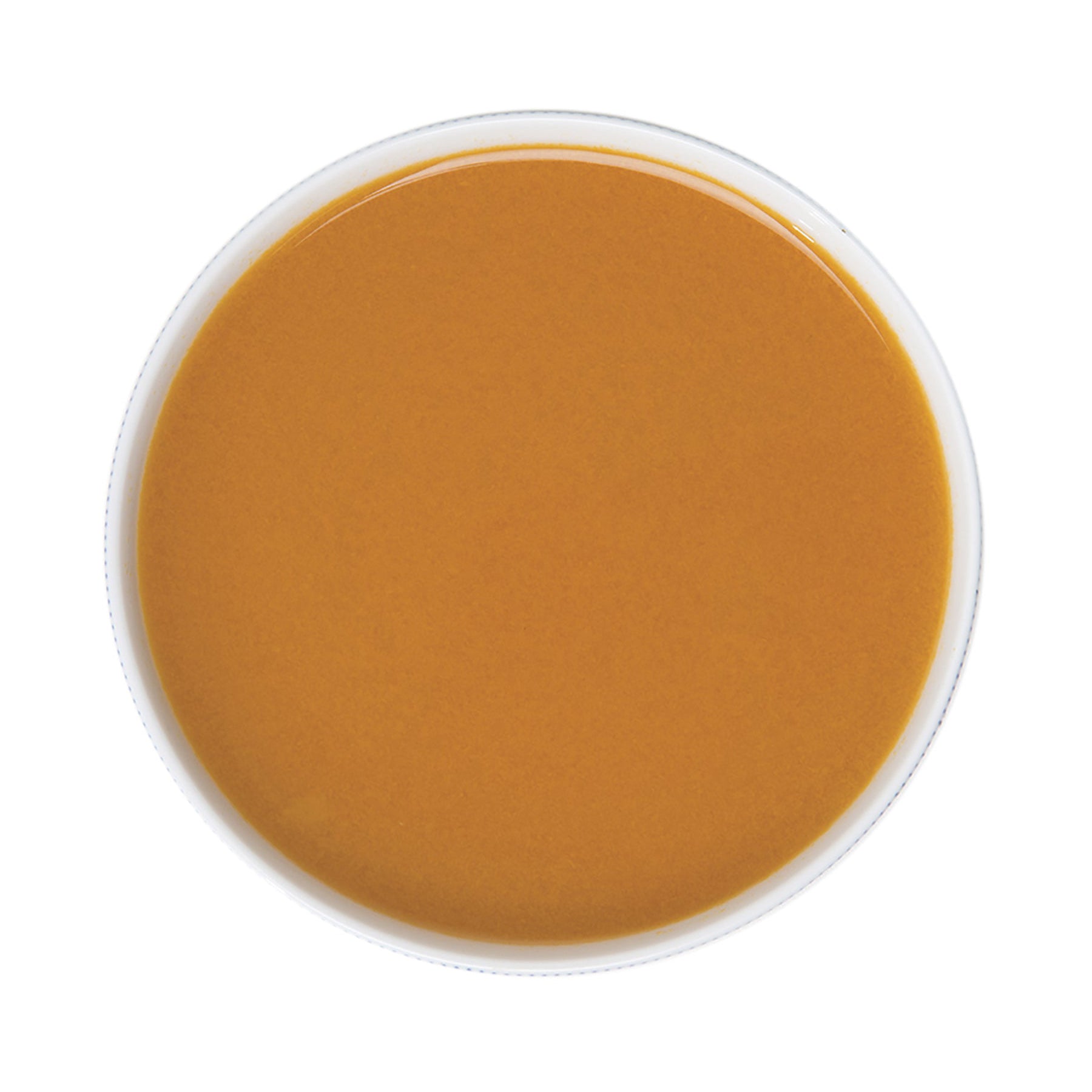 Pacific Fruit Golden Berry puree in a small container on a white background