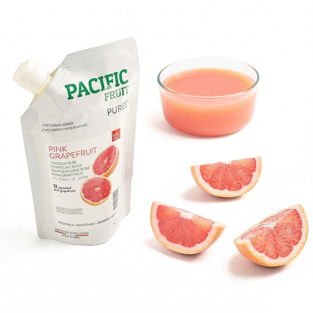 Pacific Fruit pink grapefruit puree packaging with a glass of puree juice and slices on a white background