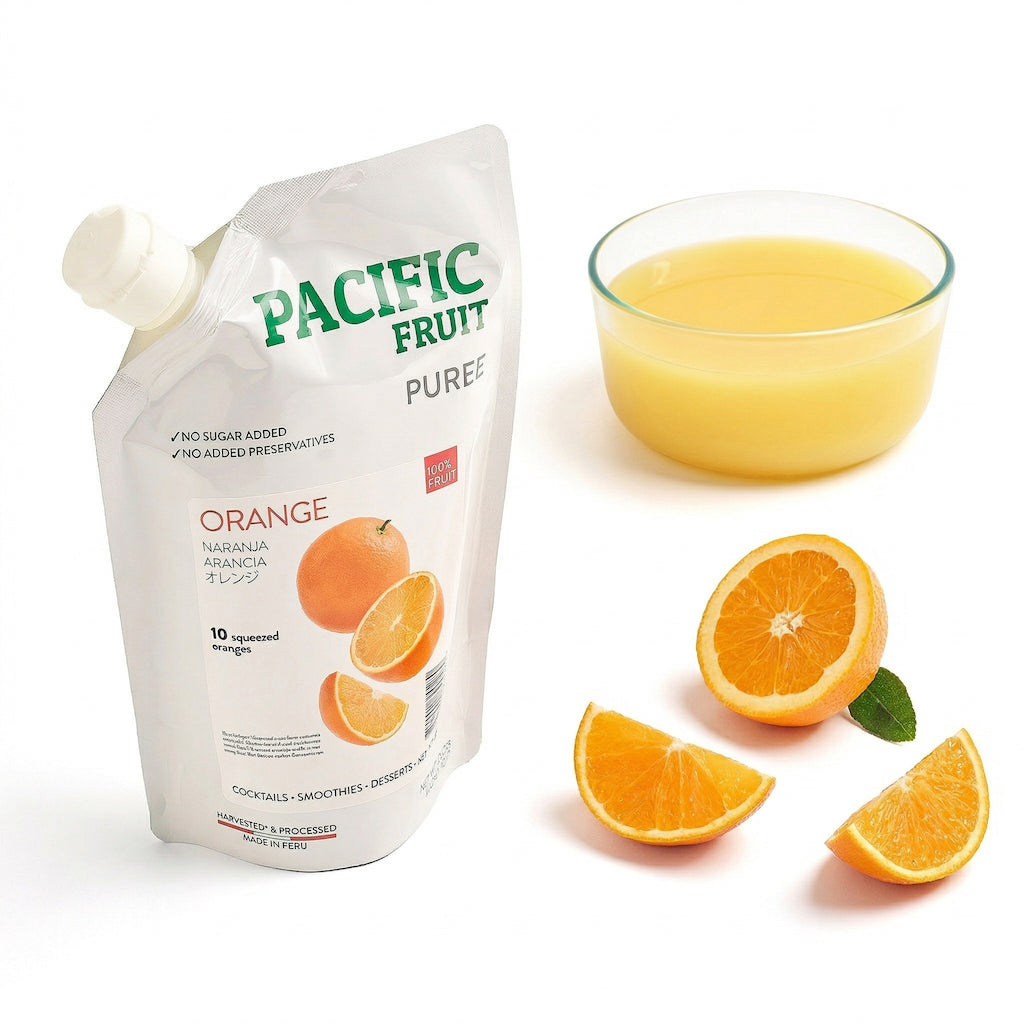 Pacific Fruits Orange puree packaging with oranges and a glass of juice on a white background