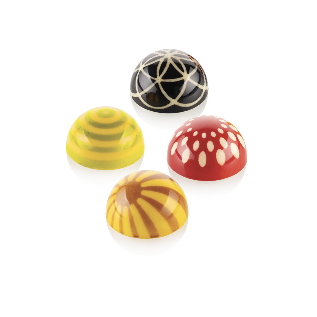 Four colorful chocolate bonbons with unique patterns on a white background