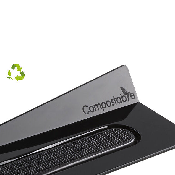 Black compostable product with 'Compostable' label on a white background