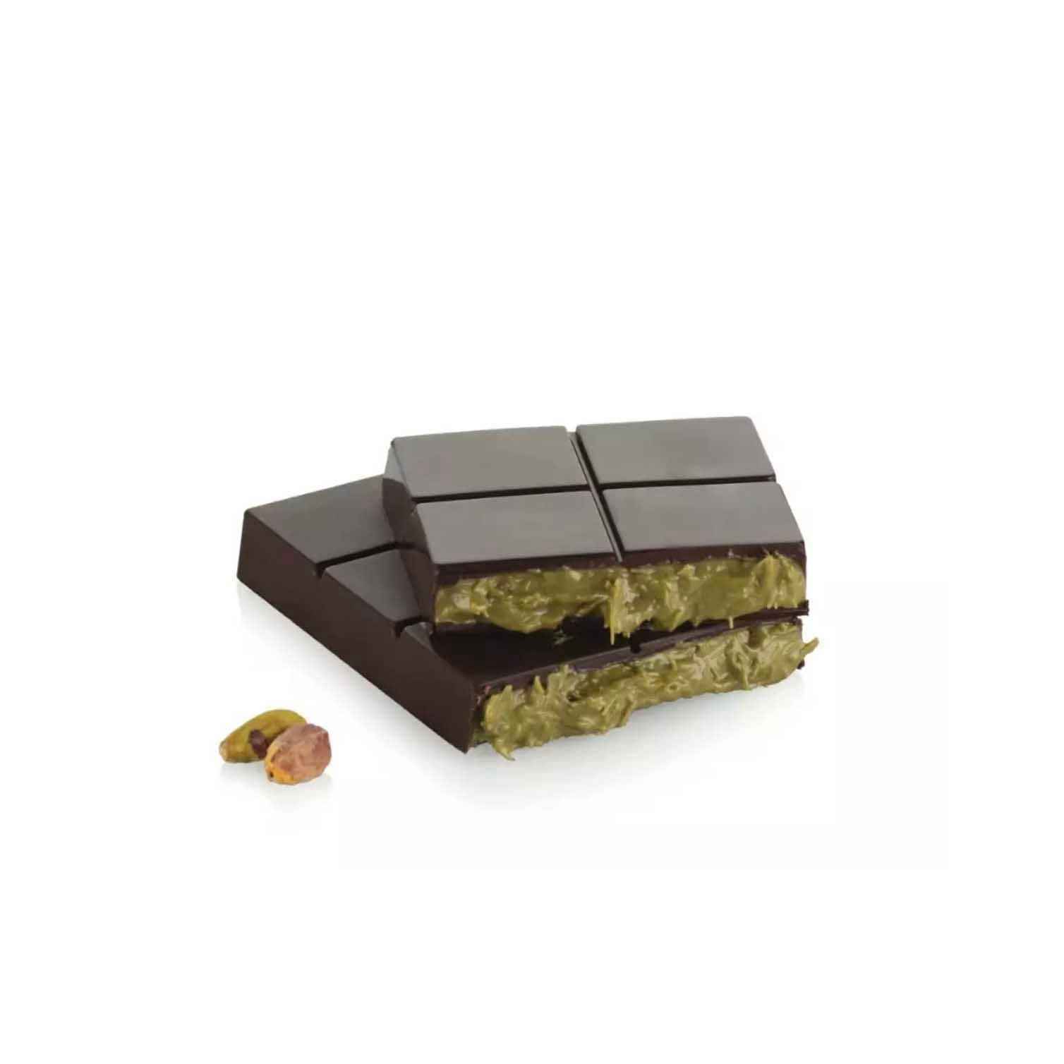 Dark chocolate bar with green filling on a white background