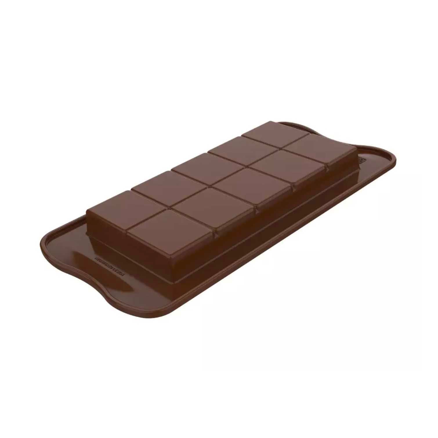 Chocolate mold with a bar of chocolate on a white background