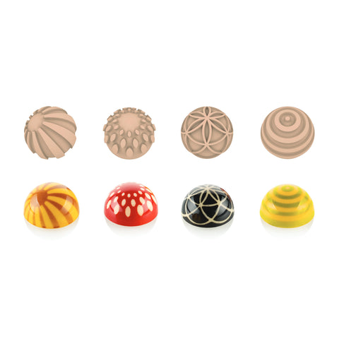 Set of colorful spherical bonbons on a white background