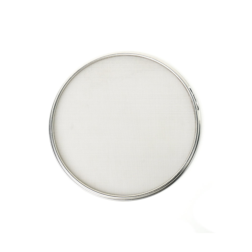 Round silver compact mesh sieve on a white background