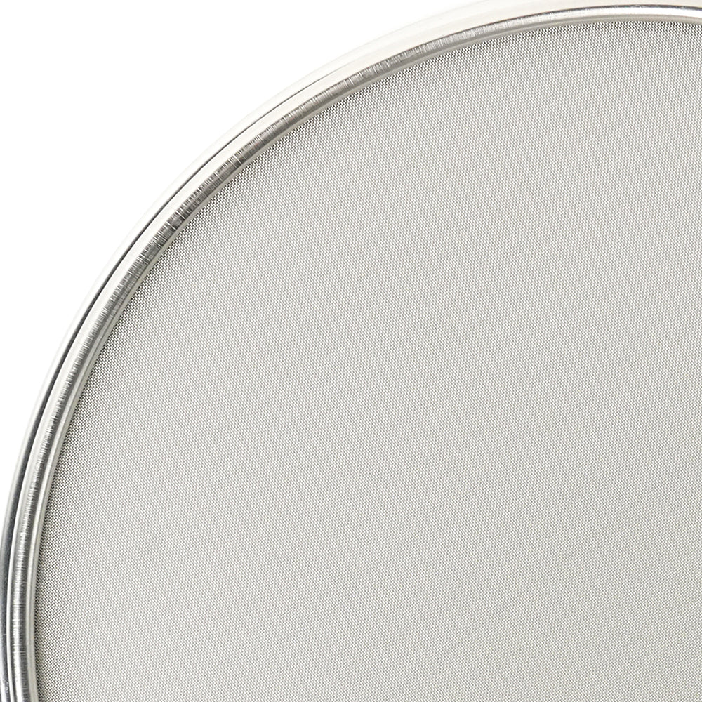 Close-up of a round metal screen with a white background