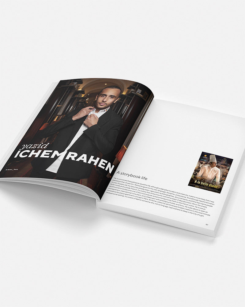 Open magazine with a cover featuring chef adjusting his tie on a white background