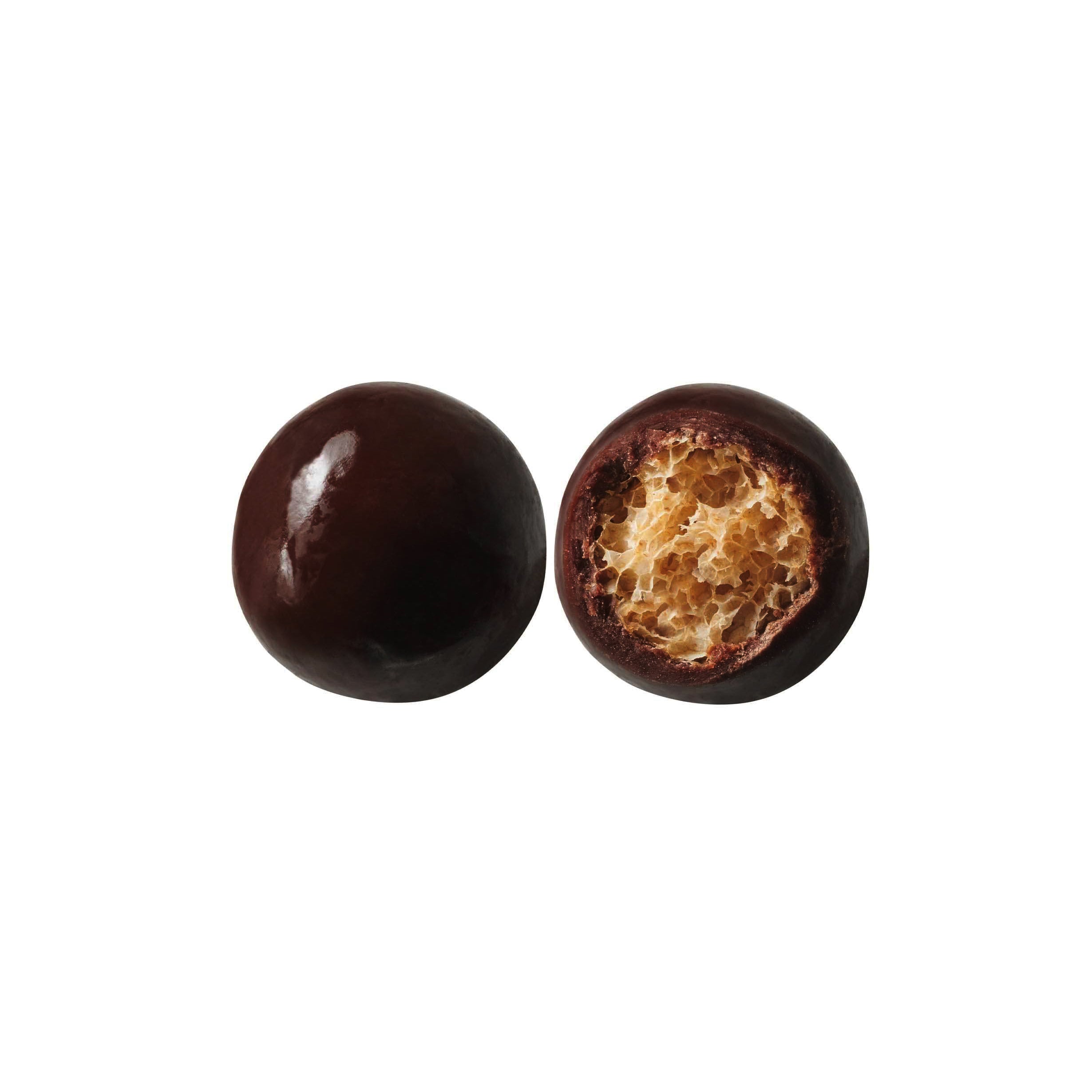 Two chocolate-covered cereal pearls on a white background