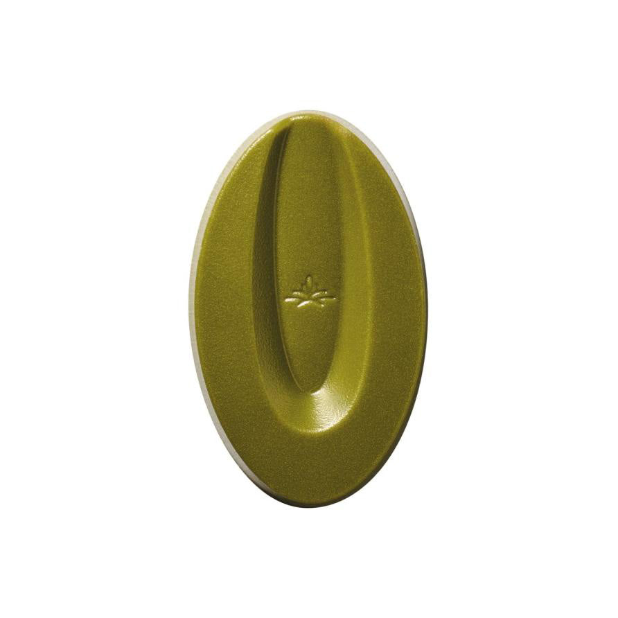 An oval-shaped Valrhona Matcha Inspiration couverture with a textured finish and a small embossed logo in the center, shown on a plain white background.