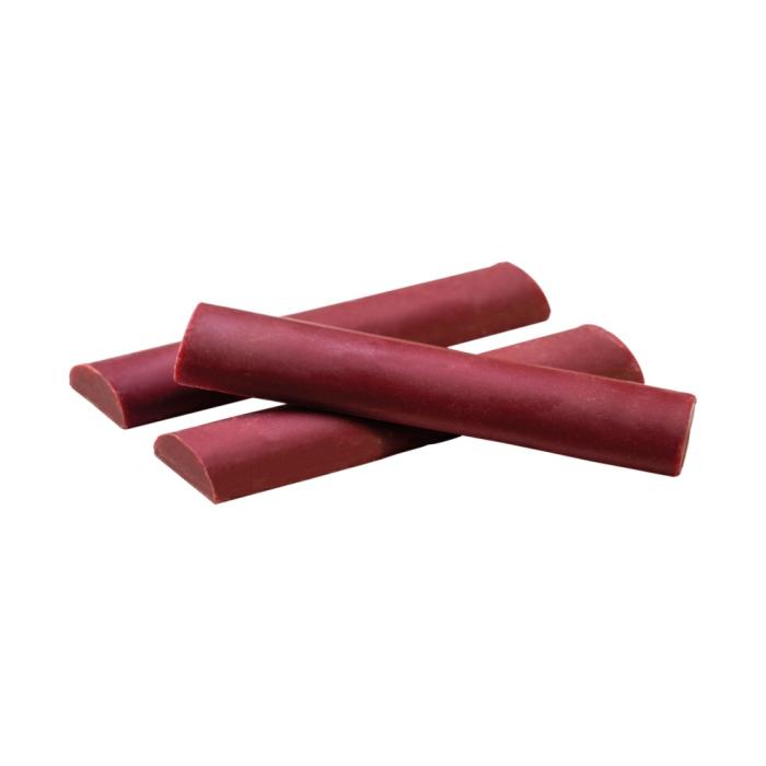 Three red cylindrical Valrhona Raspberry Inspiration Chocolate Batons on a white background