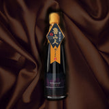 A bottle of Rosanjin Japanese soy sauce with a gold cap, set against a draped dark brown silk fabric background.